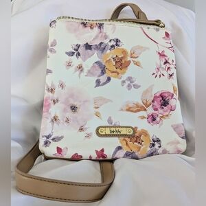 Women's crossbody bag with adjustable strap by Nicole Miller New York.